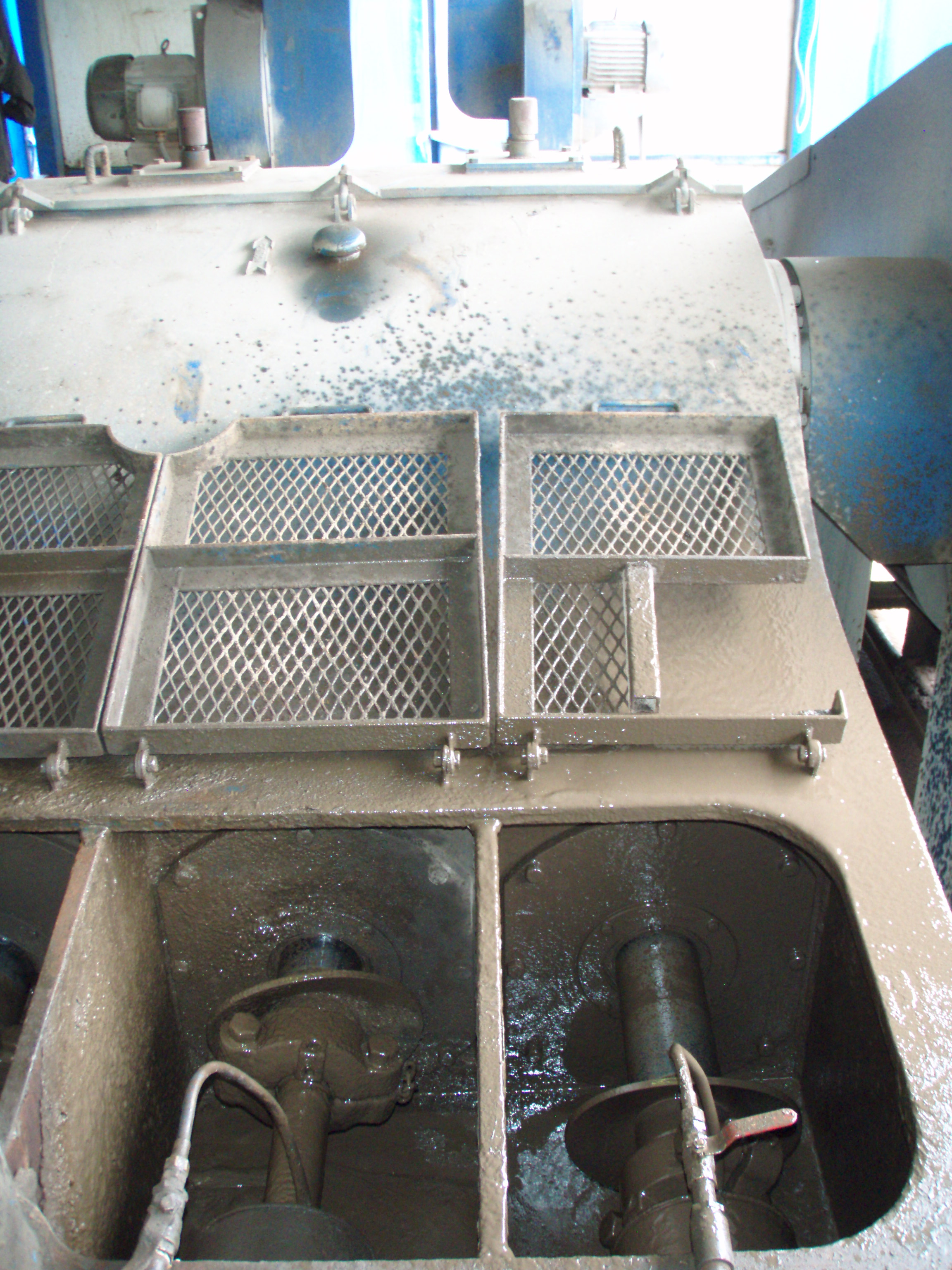 Interior mechanical detail of a mud pump on a Bakken drilling rig in North Dakota